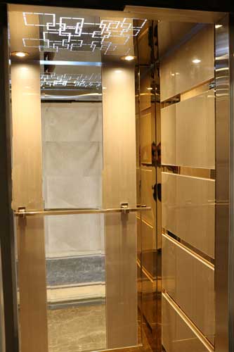 کابین آسانسور های گلاس استیل طلایی